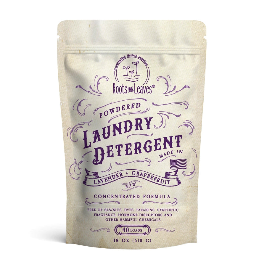 Package of powdered laundry detergent with branding on a white background